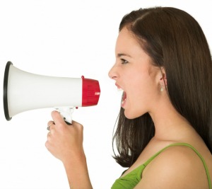 Girl shouting on the megaphone